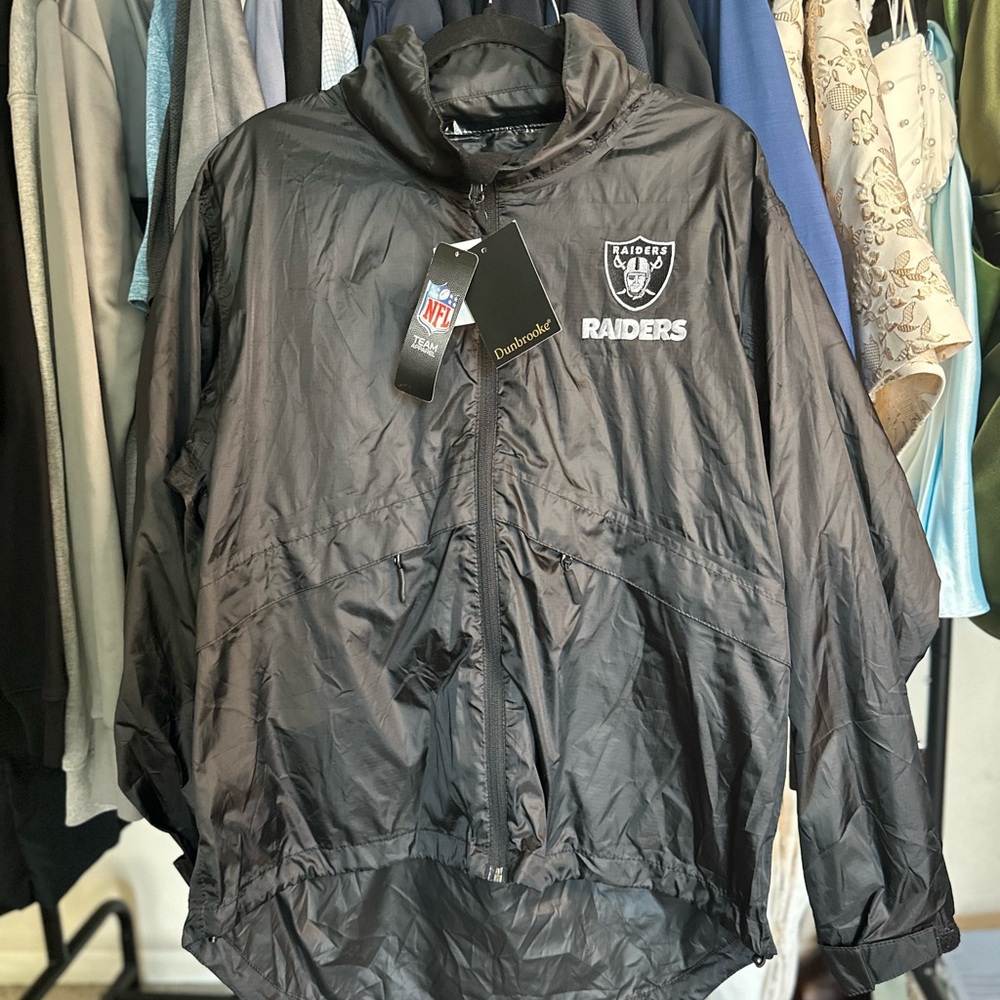 Dunbrooke Black Windbreaker Jacket with Raiders Logo and Removable Hood. New NWT